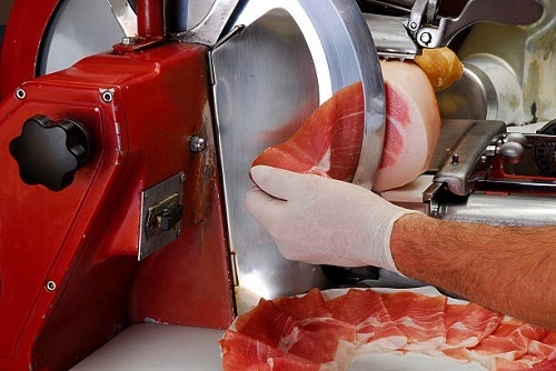 Using Meat Slicer